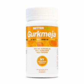 Burk med gurkmejakapslar på neutral bakgrund