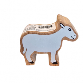 Liten träfigur lamm med mjuk färgsättning
