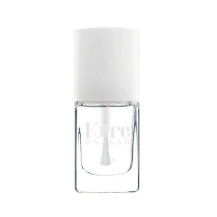 Topplack i nagellacksflaska