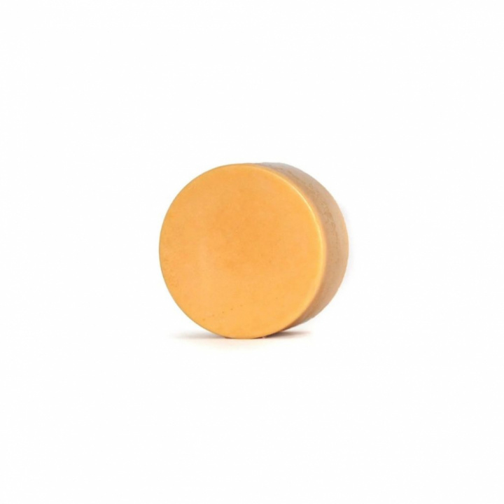 Handgjort fast ekologiskt balsam i rund form