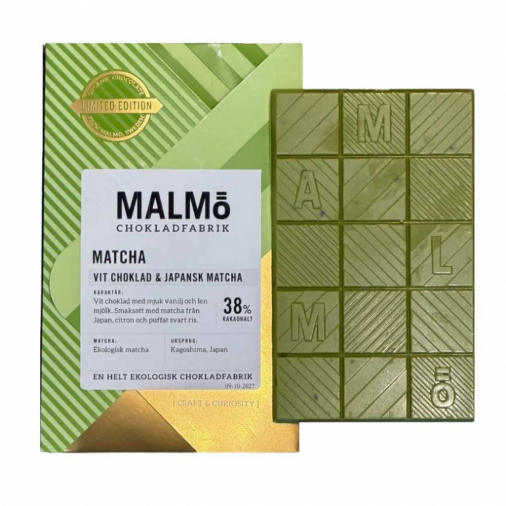 Vit choklad i förpackning med matcha, citron och svart ris